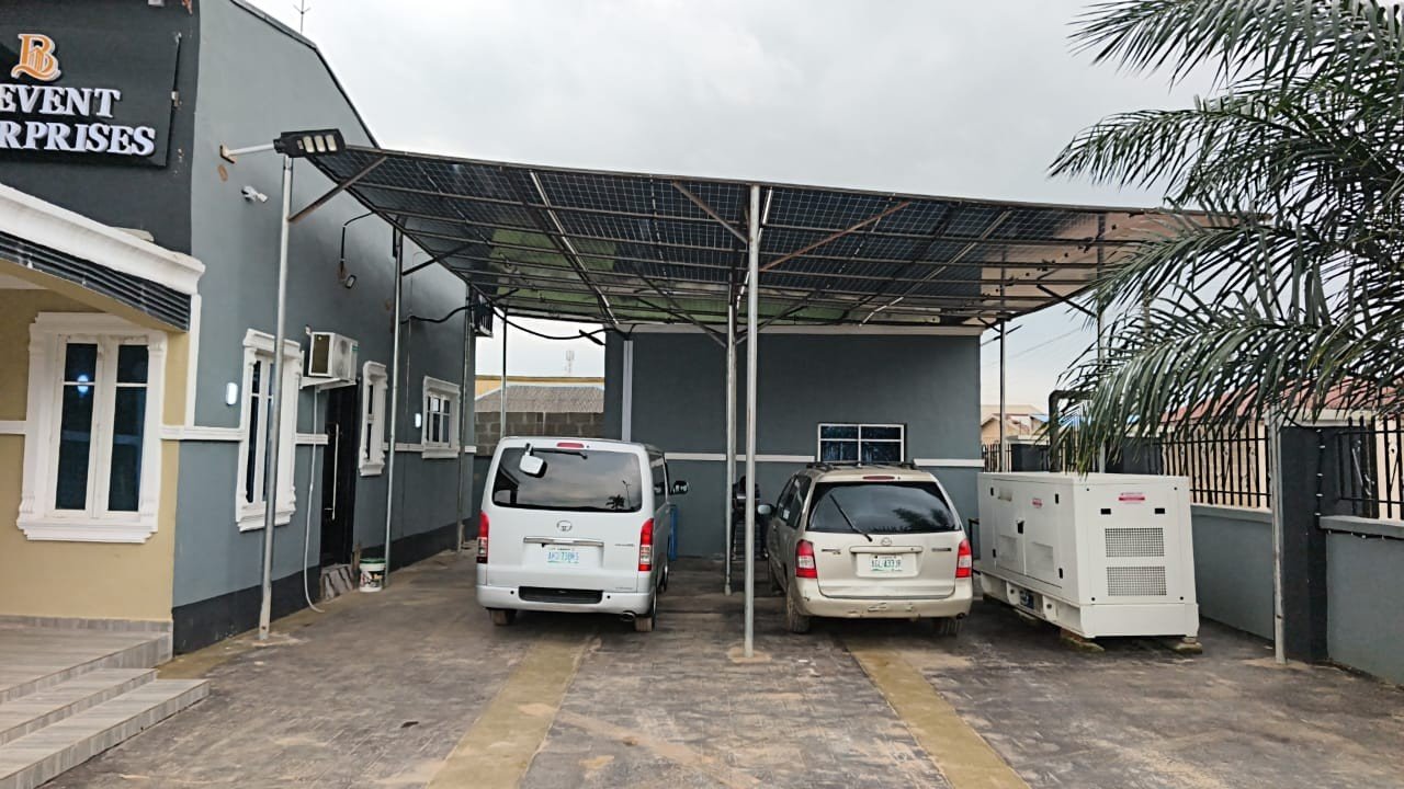 The compound - solar carport, standby generator and our coach